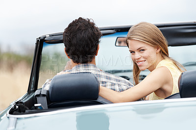 Buy stock photo Couple, smile and road trip in car for travel, love and journey with explore, adventure or vacation. People, portrait and date in convertible with driving for happy summer, holiday or freedom outdoor