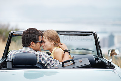 Buy stock photo Road trip, love and couple in car in city on holiday, vacation and adventure for bonding, romance and fun. Travel destination, dating and man and woman embrace for transport, journey and together