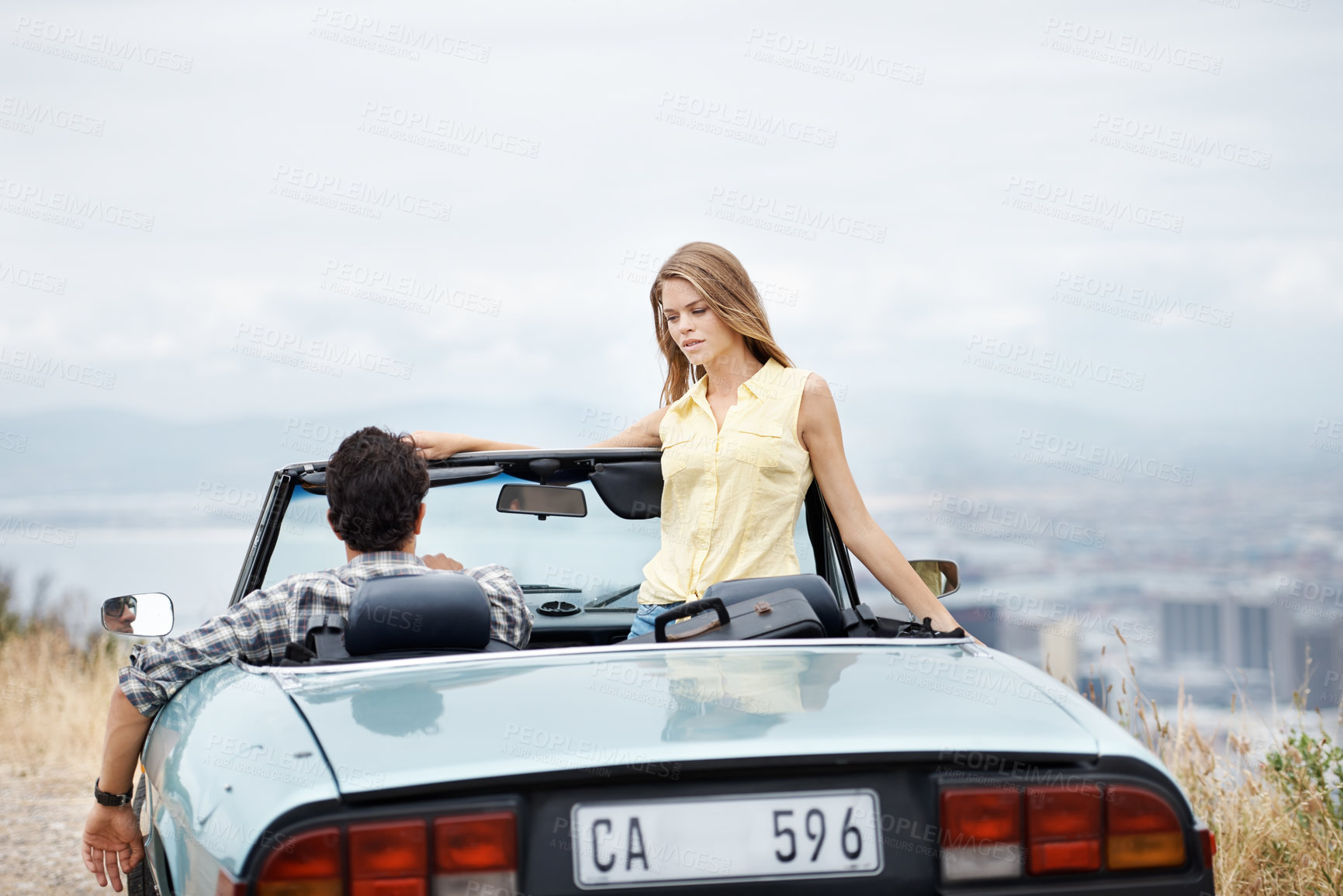 Buy stock photo Road trip, city and couple in car on cliff on holiday, vacation and adventure for bonding, love and explore. Travel destination, dating and man and woman in vehicle for transport, journey and driving