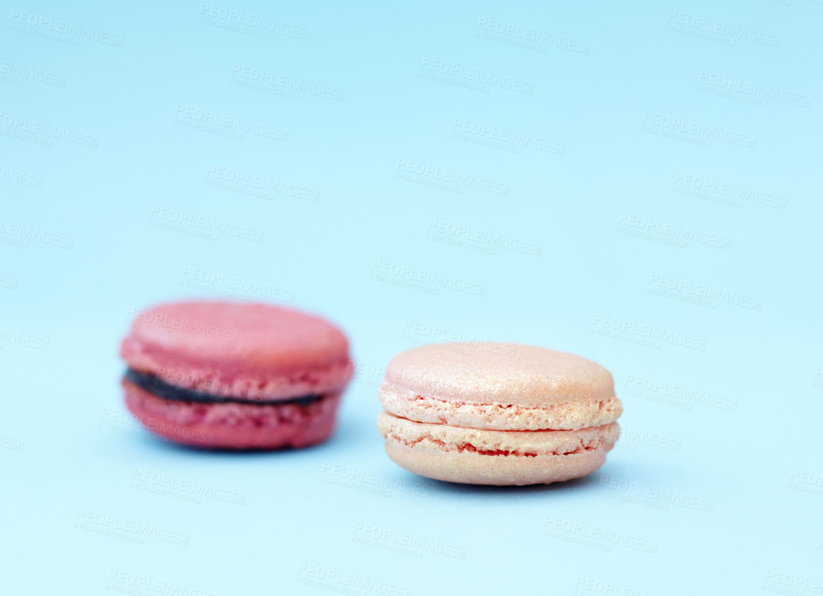 Buy stock photo Baked dessert, candy and display of french sweets with variety, delicacy and treats on blue background. Cookies, macaroons and different flavors of confectionery for bakery, fine dining and luxury