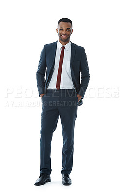 Buy stock photo A smiling businessman with his hands in his pockets while isolated on white