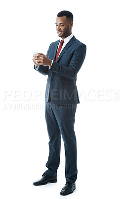 Buy stock photo A handsome young businessman isolated on white while using his mobile