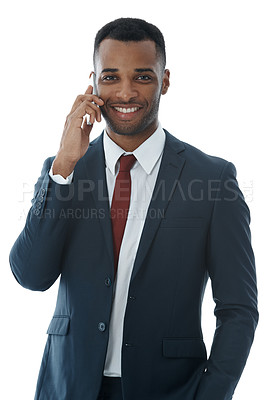 Buy stock photo An african american businessman using his smartphone while isolated on white