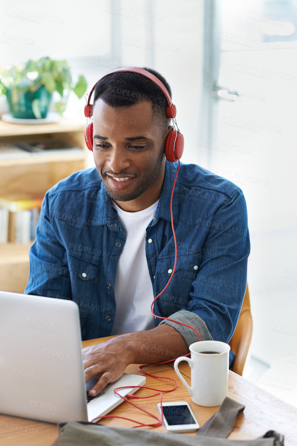 Buy stock photo Headphones, laptop and business man in office listening to audio, radio and music for working online. Professional, creative startup and happy person on computer for research, website and internet