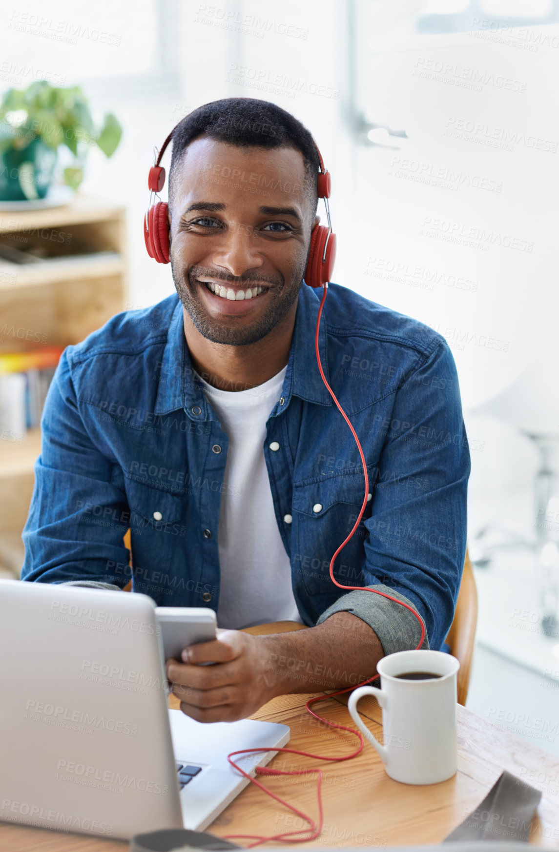 Buy stock photo Businessman, portrait and phone for music at desk with radio streaming, audio subscription or listening to sound. Black person, employee or headphones on coffee break for relax and happy in office