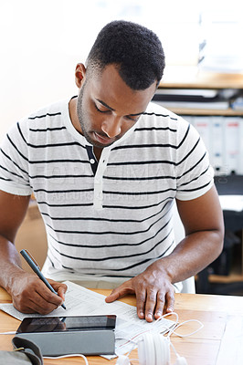 Buy stock photo Black man, reading and paperwork for signature in creative office, contract and tablet for communication. Male person, information and business deal in marketing agency, hiring agreement and policy