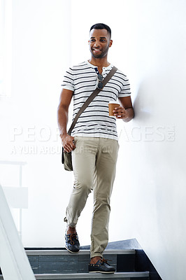 Buy stock photo Smile, walk and black man on stairs with trendy outfit, coffee and thinking for designer startup. Businessman, takeaway and African guy with creative fashion, morning routine and cool commute