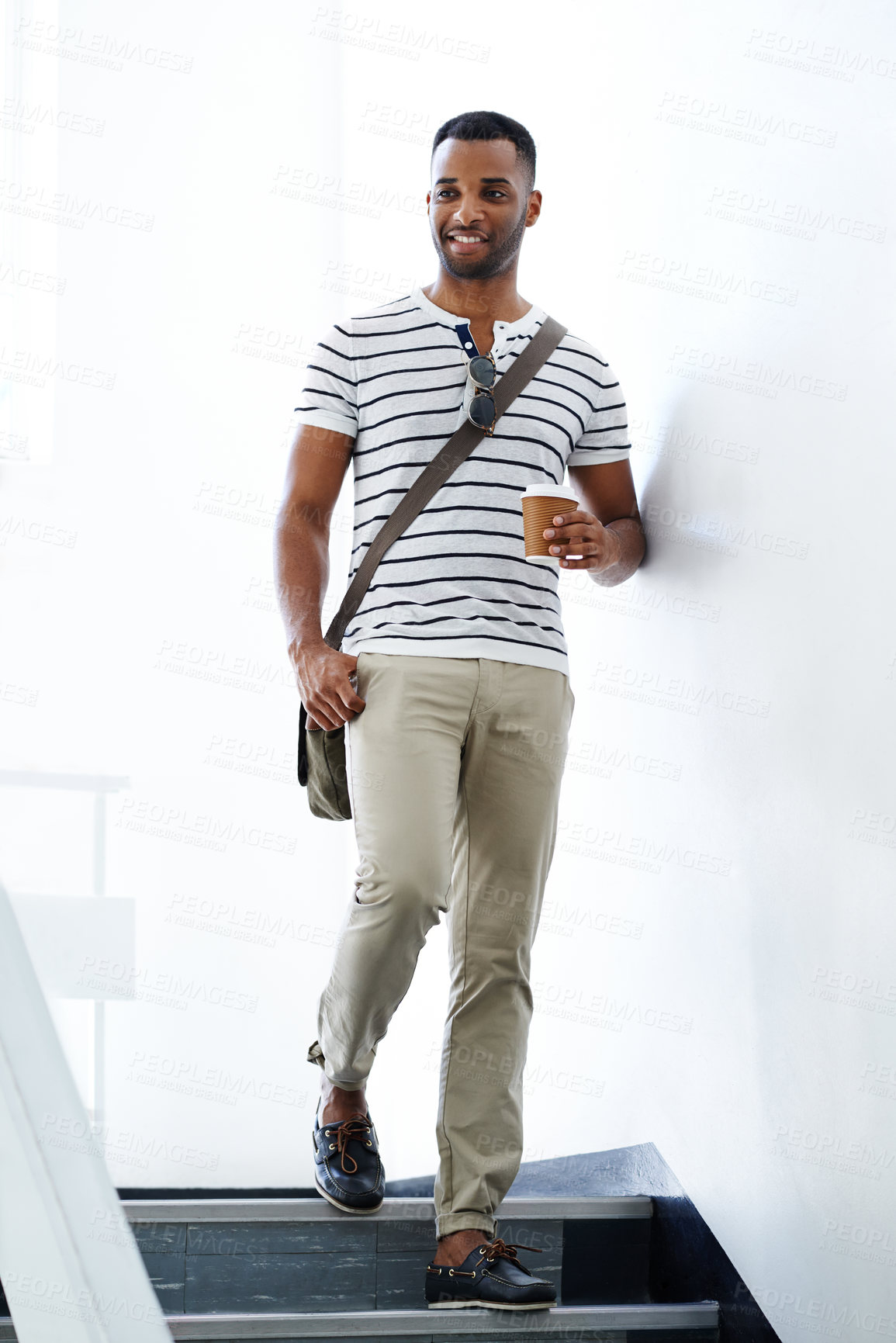 Buy stock photo Smile, walk and black man on stairs with trendy outfit, coffee and thinking for designer startup. Businessman, takeaway and African guy with creative fashion, morning routine and cool commute