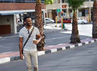 Buy stock photo Happy, creative and man walking in street for travel to job or work, coffee and thinking in morning for commute in city. Male employee, urban and outdoor for journey to designer agency in Los Angeles