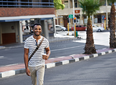 Buy stock photo Portrait, walking and black man in city with coffee, trendy outfit and smile for web designer startup. Businessman, takeaway and African guy with creative fashion, morning routine or urban commute