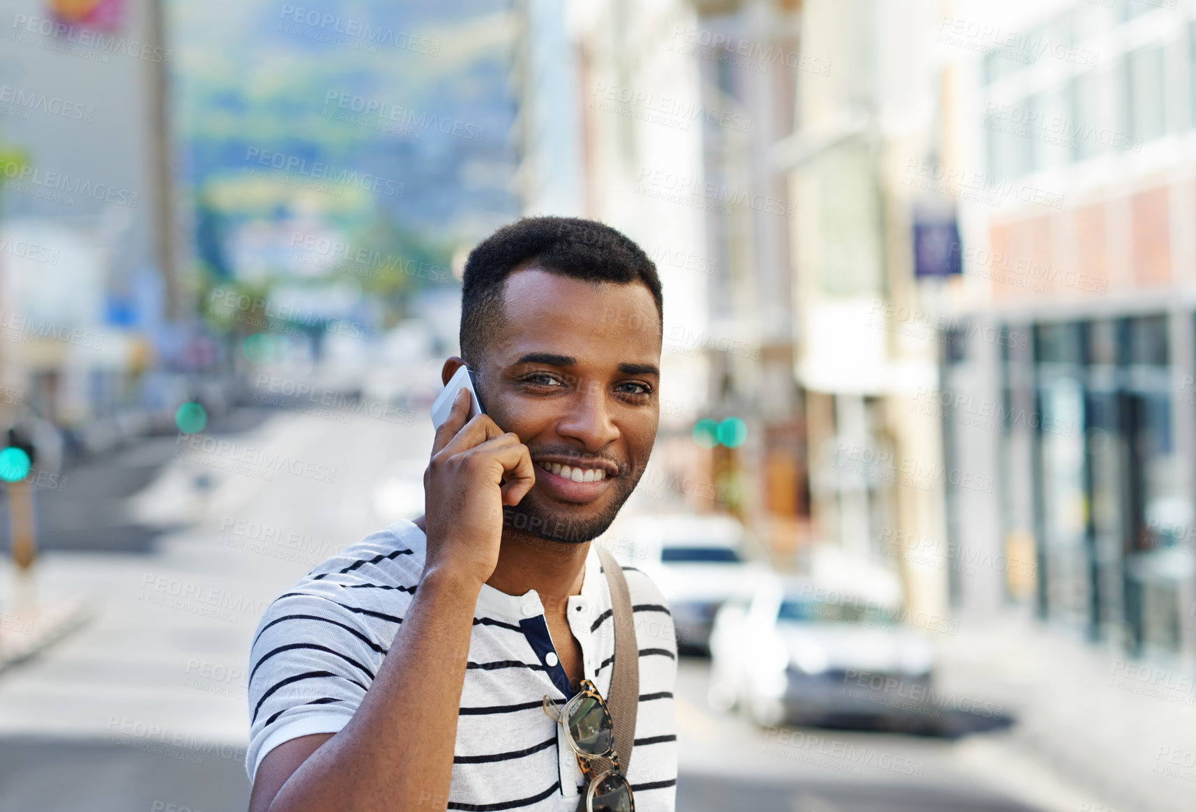 Buy stock photo Man, phone call and portrait for communication in city, talking and mobile app with connection. Happy, listen and conversation with virtual contact, smile and creative business person for negotiation