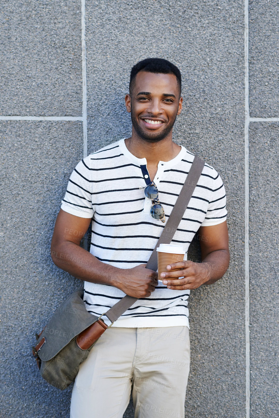 Buy stock photo Portrait, wall background and black man in city with coffee, trendy outfit and smile for web designer startup. Businessman, takeaway and African guy with fashion, morning routine or New York commute