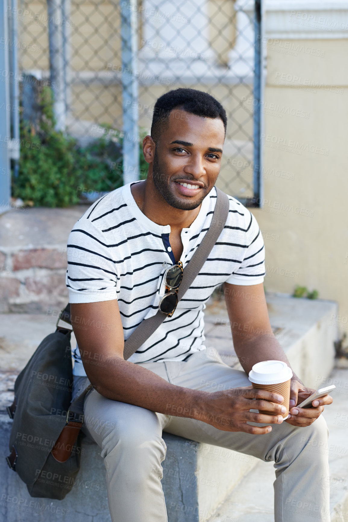 Buy stock photo Outdoor, black man and smile with smartphone or coffee for work break on social media in New York. Male person, happy and confident on portrait with networking or communication and satisfied