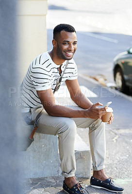 Buy stock photo Black man, coffee and phone in city for business, positivity and relax in afternoon. Male person, tech and smile on sidewalk for support local, new opportunity or commute to job interview in New York