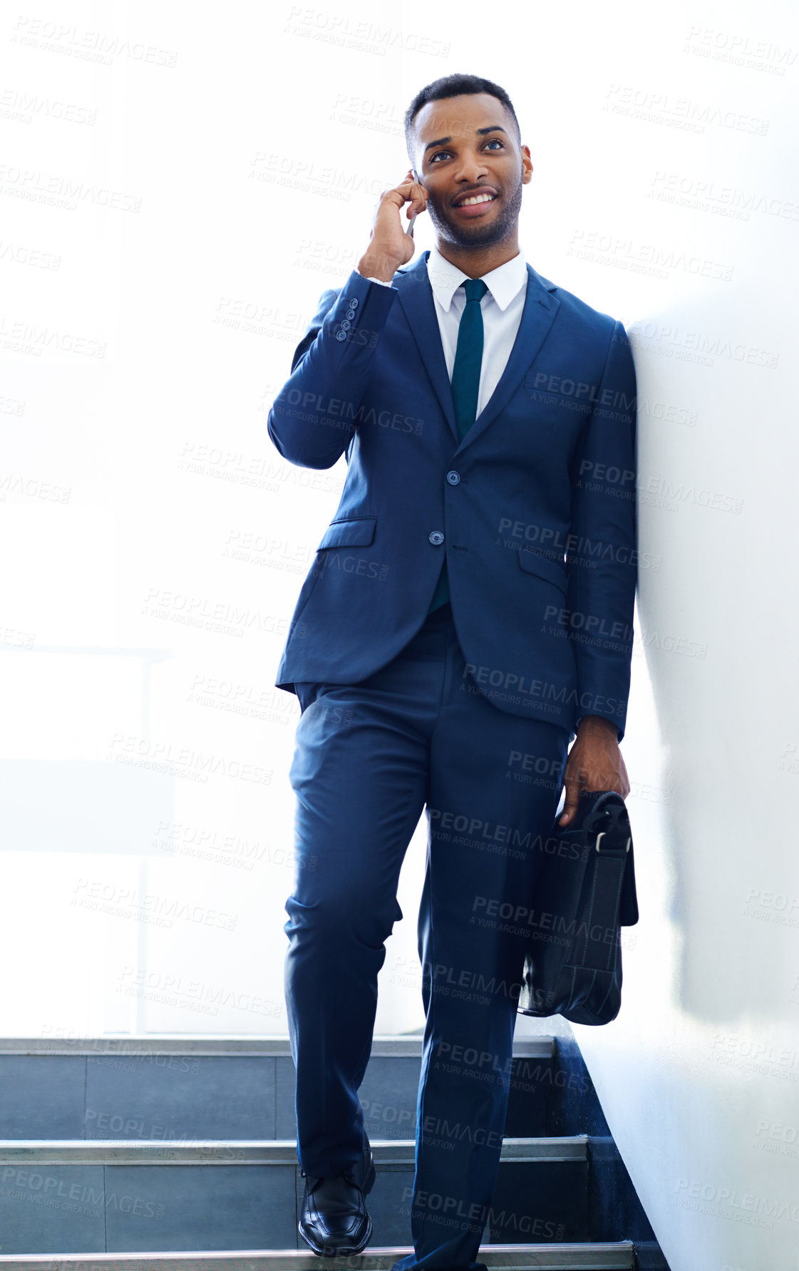 Buy stock photo Black man, talking and phone call for business conversation, deal negotiation and chat in office. African attorney, mobile hello and discussion for legal case, justice and client feedback by stairs