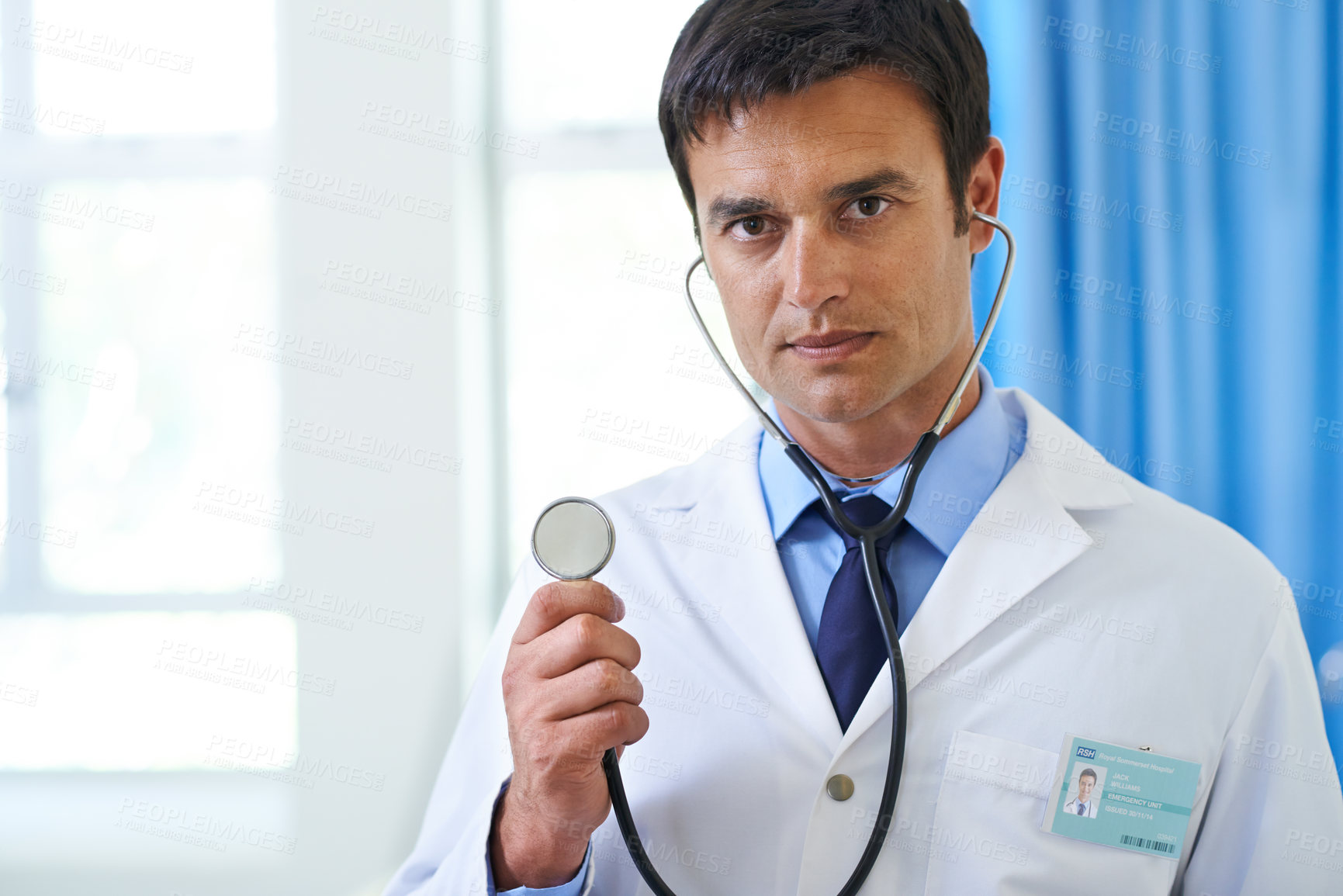 Buy stock photo Cardiologist, man and portrait with doctor in office, stethoscope and medical instrument in check up. Heart rate, monitor and wellness service in clinic employee, professional and health consultation