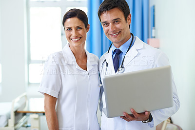 Buy stock photo Doctor, nurse and portrait with laptop in hospital for patient records, results and review medical diagnosis. Man, woman and online for clinical documentation, treatment planning and administration.