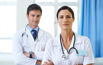 Buy stock photo Confident, woman and portrait of doctor in hospital for patient care, emergency team and healthcare professionals. Medical worker, pride and proud of career in helping people, insurance and trust.