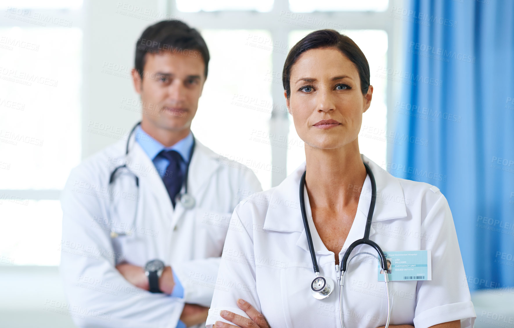 Buy stock photo Confident, woman and portrait of doctor in hospital for patient care, emergency team and healthcare professionals. Medical worker, pride and proud of career in helping people, insurance and trust.