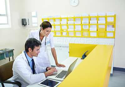 Buy stock photo Doctor, nurse and reception in hospital on laptop, discussion and planning for patient schedule in clinic. Medical employees, healthcare service and people together, teamwork and professional
