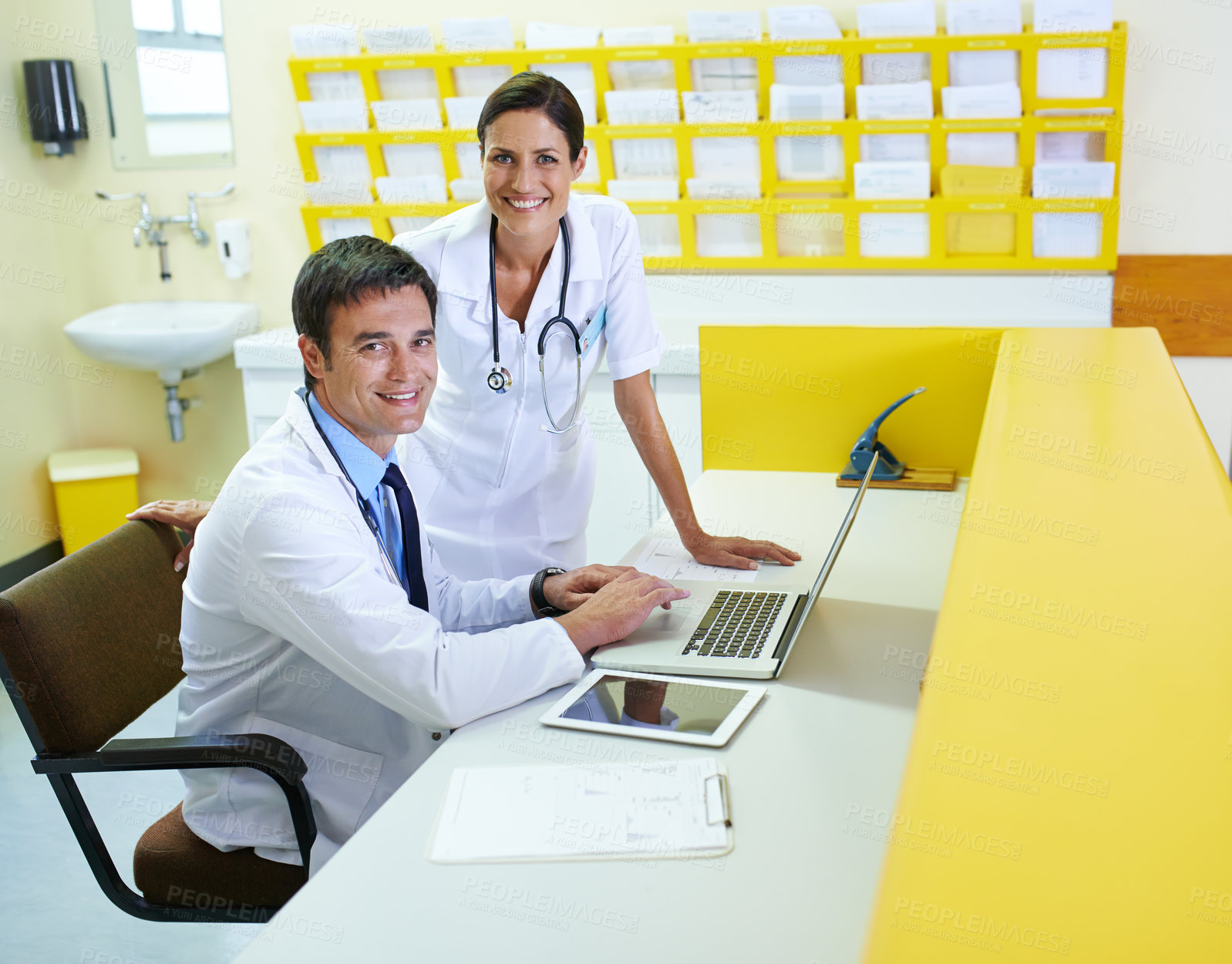 Buy stock photo Doctor, nurse and reception portrait on laptop, discussion and planning for patient schedule in clinic. Medical, healthcare service and people together, teamwork and email results in hospital
