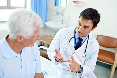 Buy stock photo Doctor, senior man patient and talk with information, results and news with consulting health in retirement at clinic. Men, medic and consultation for wellness, healthcare and discussion in hospital