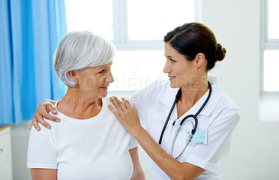 Buy stock photo Consultation, doctor and old woman in hospital for advice, help and support at senior care clinic. Retirement, counselling discussion and nursing home, happy elderly patient sitting on bed with nurse