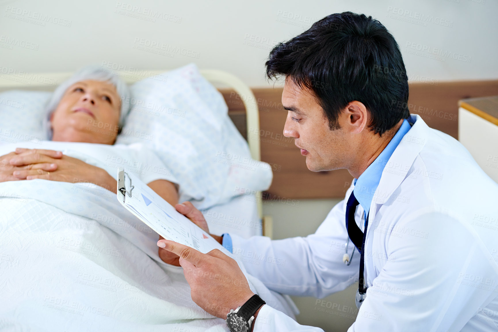 Buy stock photo Hospital, senior woman and doctor with clipboard for consultation, diagnosis or communication. Healthcare, discussion and physician with patient for results, explain or medical services in clinic