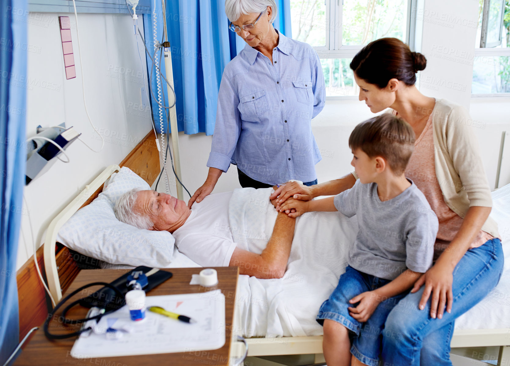 Buy stock photo Elderly man, sick and family in hospital for support with visit, love relationship and solidarity. Patient, care and group of people with empathy for injury with kindness, accident and unity together