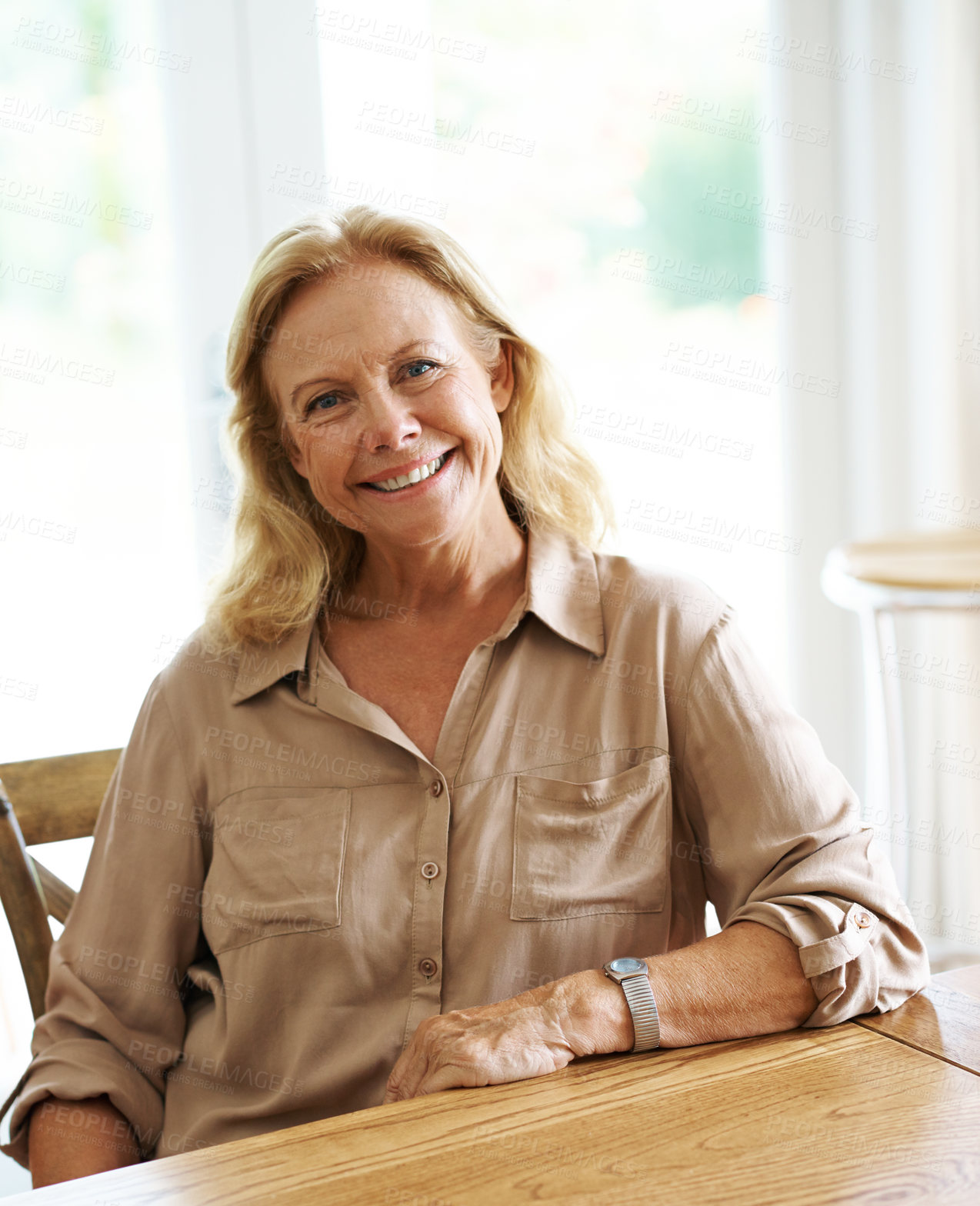 Buy stock photo Portrait, relax and smile with mature woman at dining room table of home for break or wellness. Face, peaceful and satisfaction with happy person in apartment for weekend leisure or time off