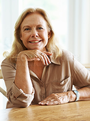 Buy stock photo Portrait of one happy senior caucasian woman with blonde hair relaxing at home. Wise old carefree and cheerful smiling retired female feeling optimistic about life and ageing gracefully
