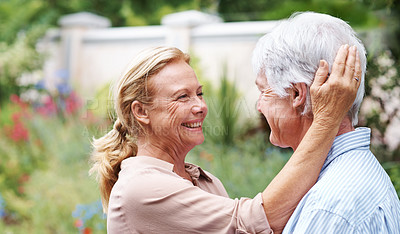 Buy stock photo Romantic, love or senior couple in garden to relax, care or enjoy bonding together in retirement. Nature, mature woman or happy elderly man in park for trust, support or peace in marriage commitment