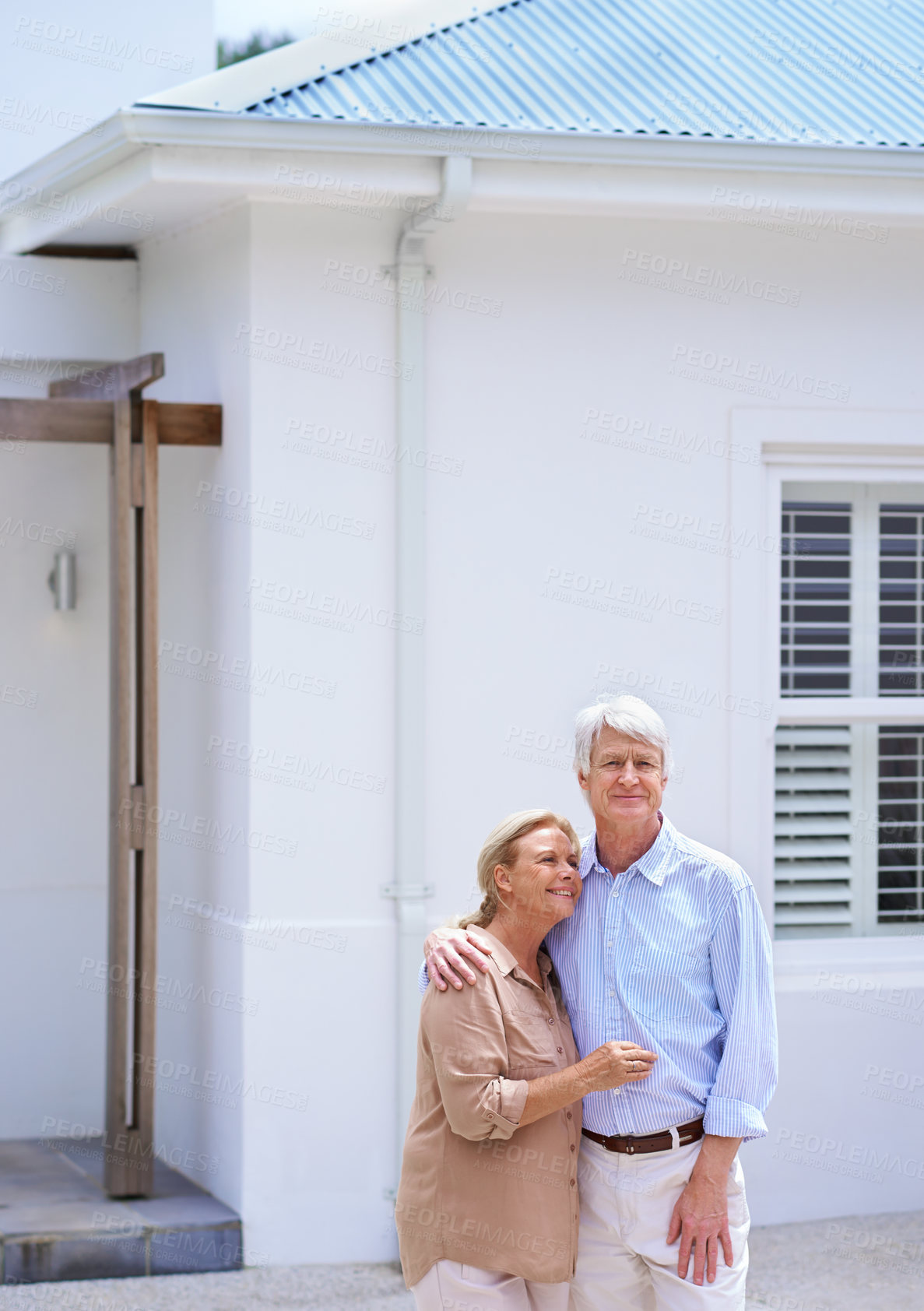 Buy stock photo Senior couple, hug and new home outdoor for dream real estate investment, mortgage or loan. Retirement, man and happy woman by property sale for moving, relocation and life insurance with homeowners