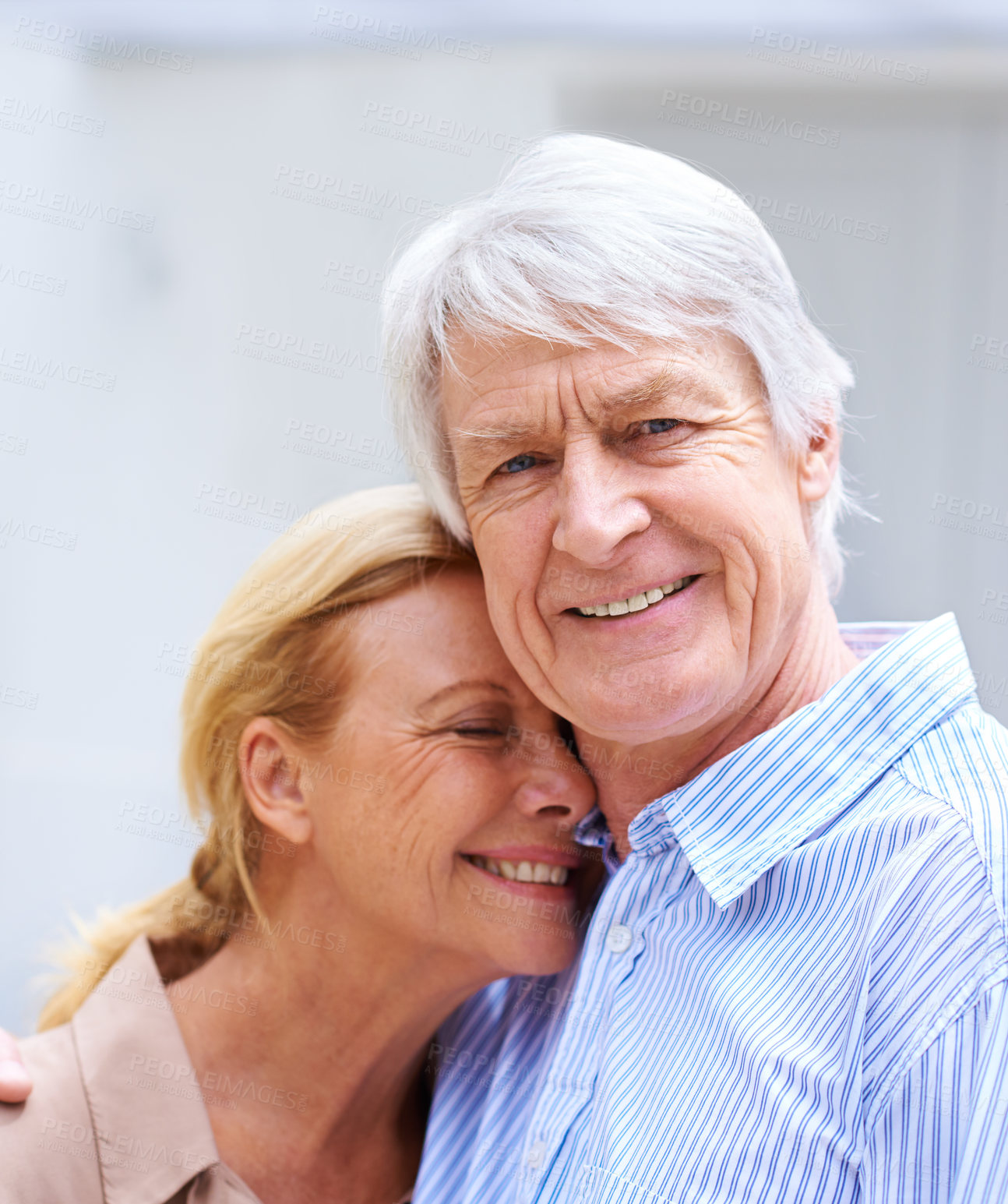 Buy stock photo Senior couple, smile and hug outdoor for love, support and care together at backyard of home. Retirement, man and happy woman embrace at property for connection, loyalty or commitment with soulmate