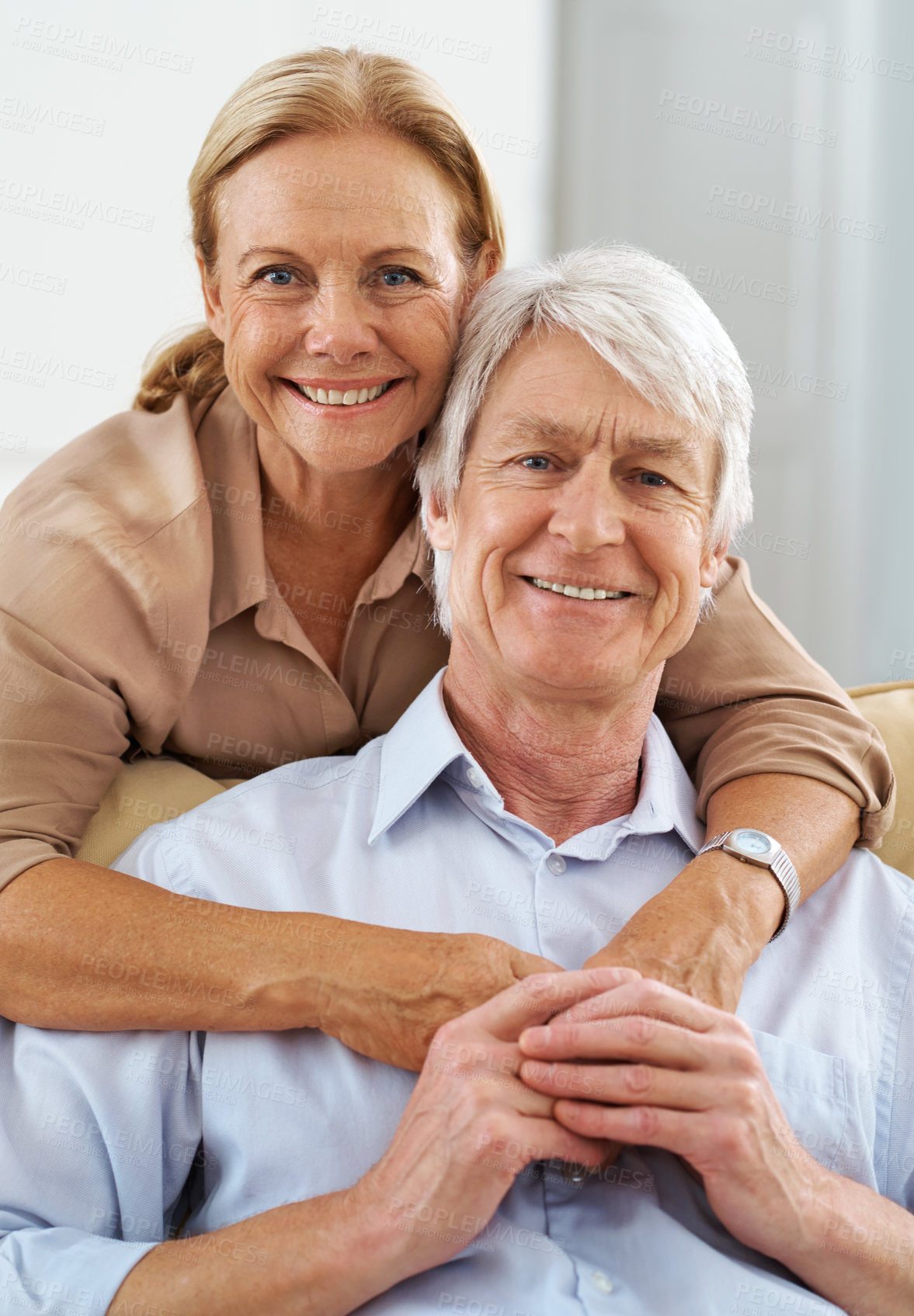 Buy stock photo Senior, portrait and happy couple holding hands in home for love, support and care together. Face, man and woman embrace for connection, loyalty or relationship commitment with partner in retirement