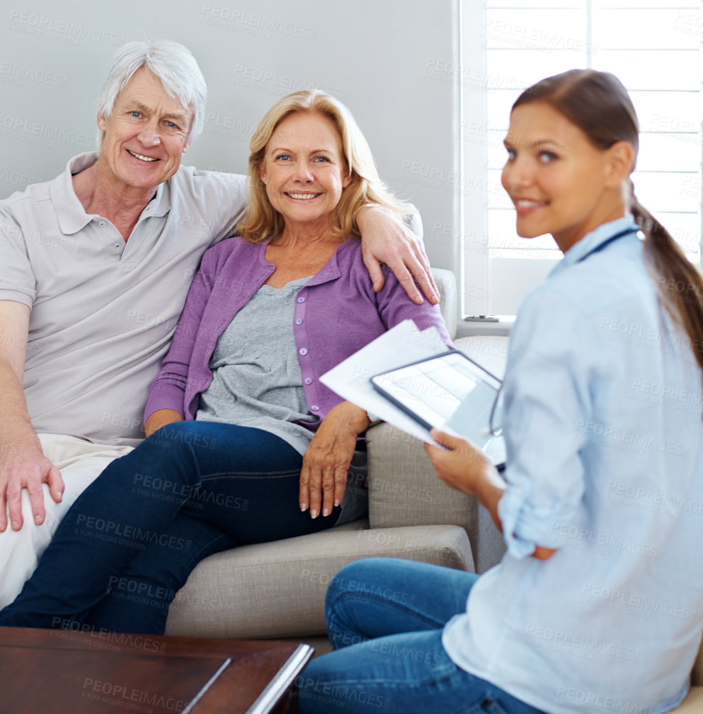 Buy stock photo Old couple, nurse and tablet in home portrait, helping and review online insurance application. People, doctor and medical website for patient results, talking and caregiver consulting on info form