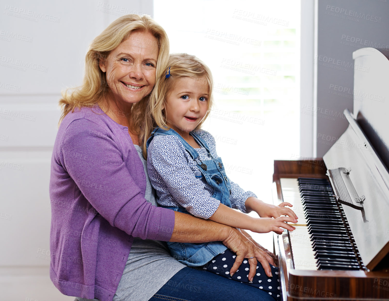 Buy stock photo Piano, family and portrait in home for music, development and happy for learning in lounge. Woman, creative and girl or kid in living room with string instrument, keyboard and sound or talent for art