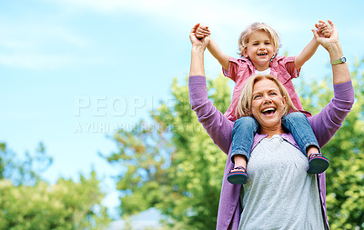 Buy stock photo Portrait of a happy grandmother holding her grandchild on her shoulders