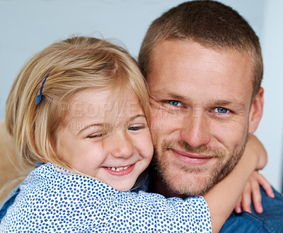 Buy stock photo Portrait of an adorable little girl hugging her father around the neck