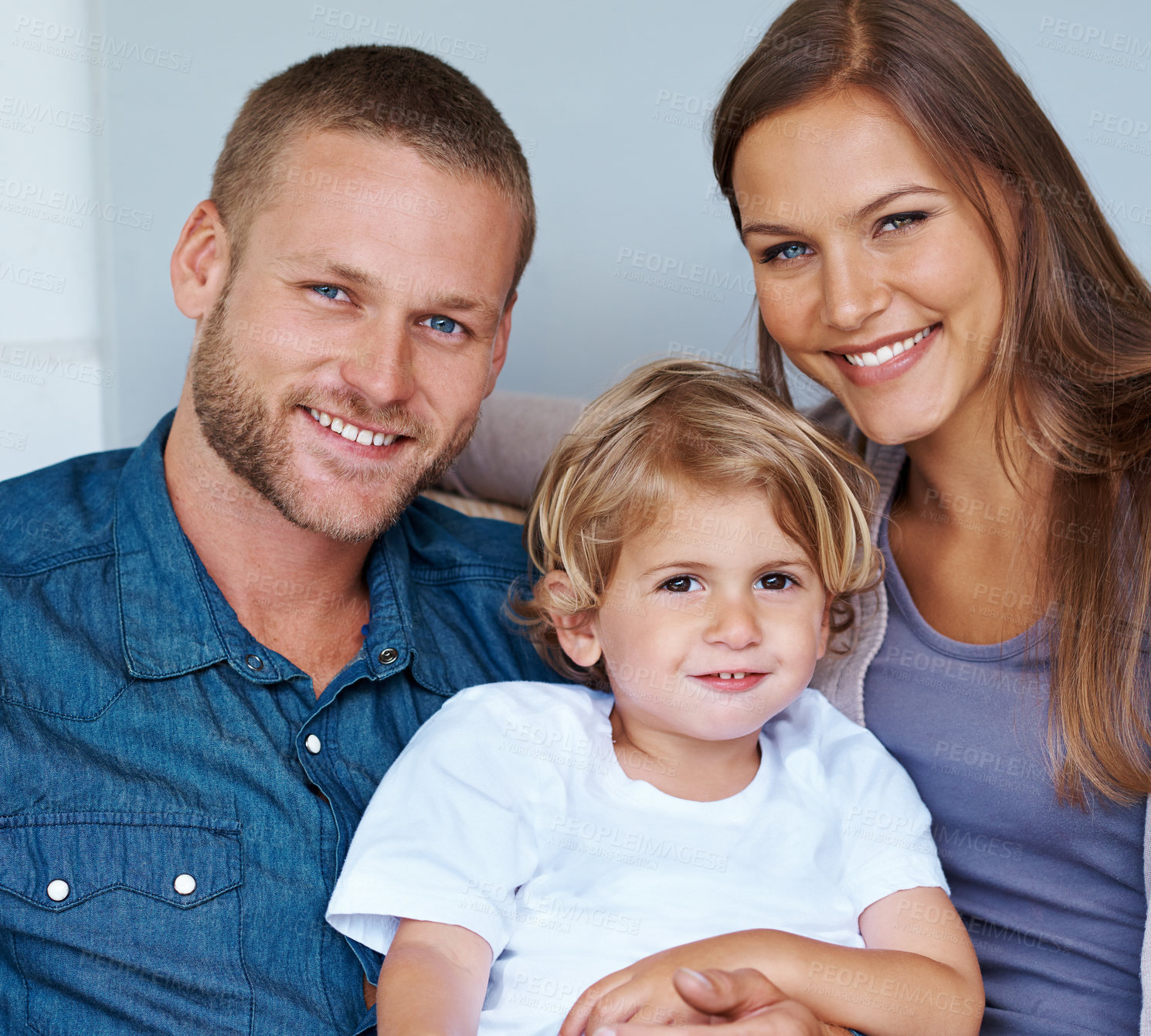 Buy stock photo Portrait of a happy family of three