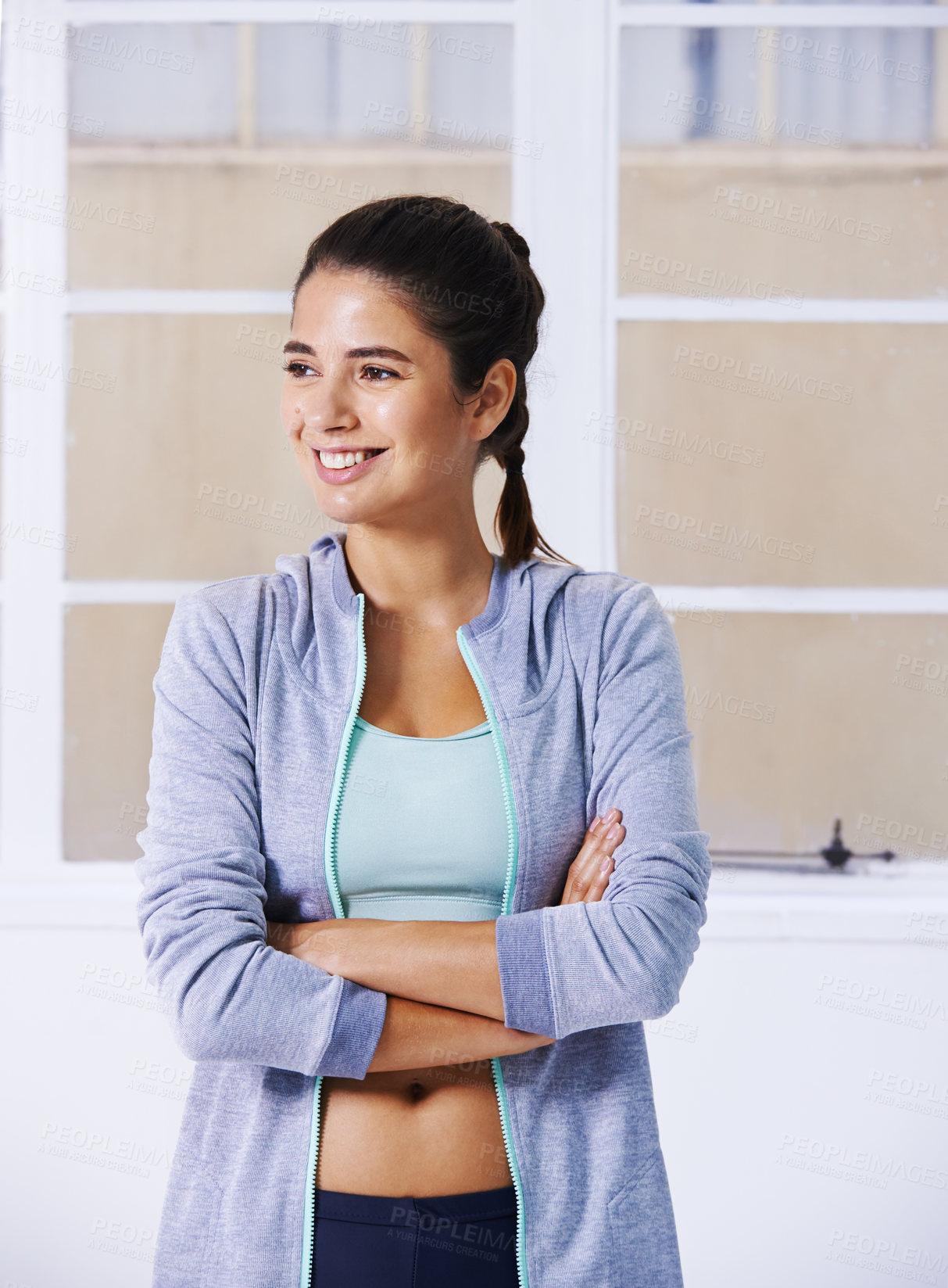 Buy stock photo Fitness, woman and thinking at window with smile, catch breath and rest from workout. Female athlete, healthy body and ambitious in training with break, sweaty and determination in gym for wellness