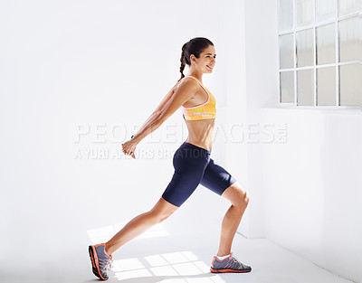 Buy stock photo Happy woman, fitness and stretching with body in exercise, workout or training at indoor gym. Active or young female person in warm up for physical activity, performance or wellness at health club