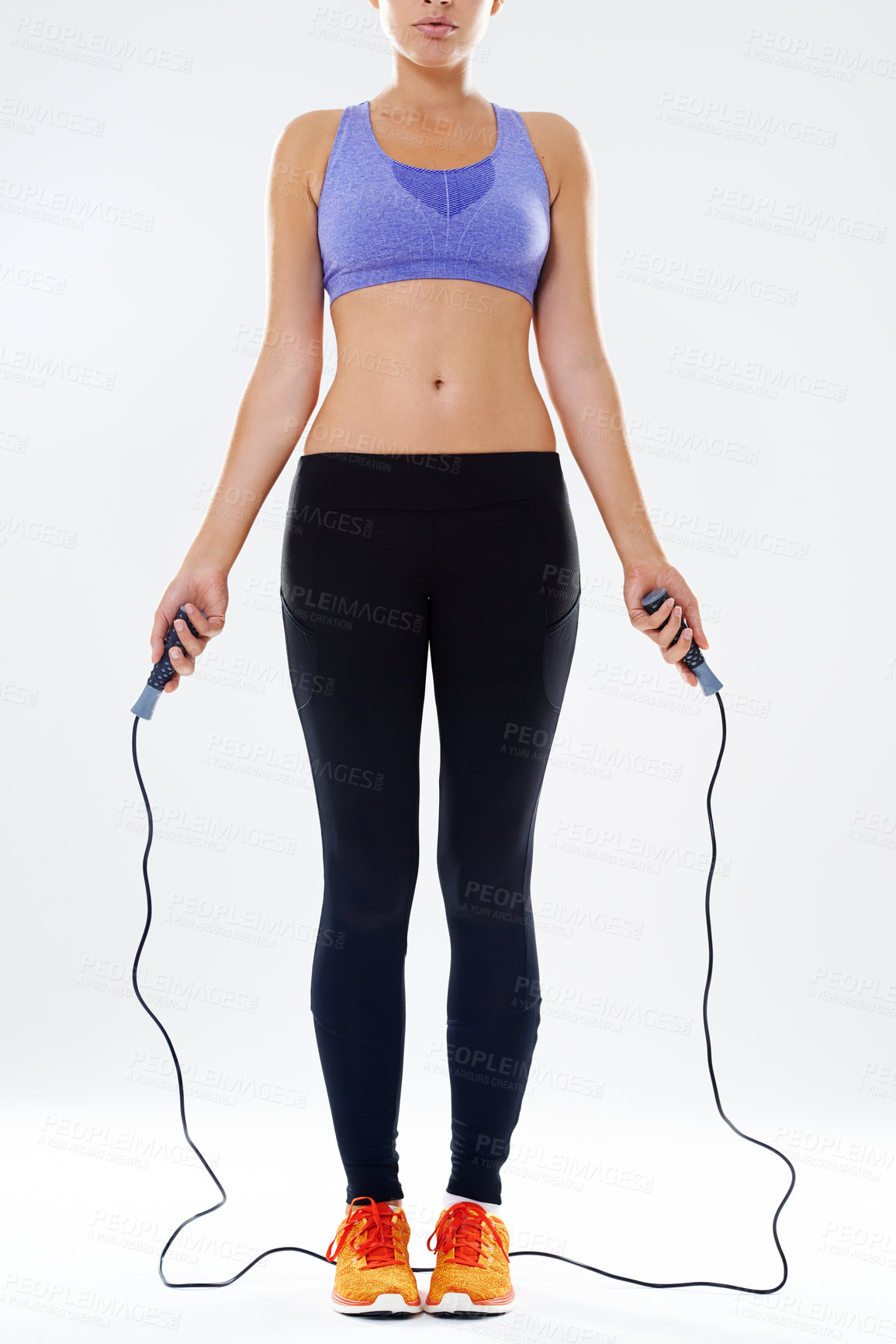 Buy stock photo Woman, fitness and cardio with jump rope for workout, exercise or training on a white studio background. Active female person or athlete with gear, string or wire for skipping, endurance or stamina