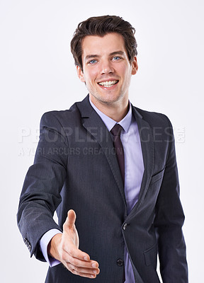 Buy stock photo Businessman, portrait and happy in studio with hand shake for corporate deal, greeting and agreement. Male person, entrepreneur and smile or proud with confidence for opportunity and congratulation