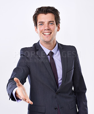 Buy stock photo Businessman, portrait and smile in studio with hand shake for corporate deal and agreement. Male person, entrepreneur and happy with confidence for opportunity, congratulation and white baykgeounbd