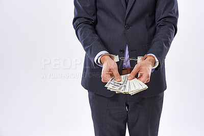 Buy stock photo Handcuffs, cash and hands of businessman with dollars for fraud, bribery or money laundering. Law, financial crime and punishment of criminal with justice, court and stealing with corruption or scam