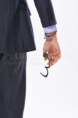 Buy stock photo Hands, business and person with handcuffs in studio for security freedom, corporate challenges and crime solution. Employee, steel lock and justice help of case dismissal, legal and white background