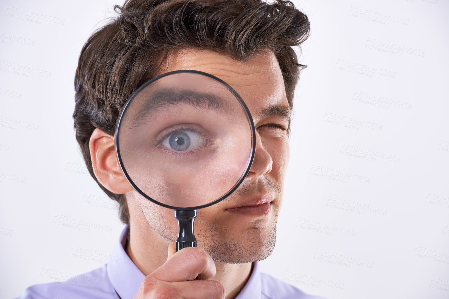 Buy stock photo Portrait, eye and man with magnifying glass, investigator and audit at company isolated on white studio background. Face, male employee and PI with compliance and fair trade evidence or information