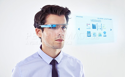 Buy stock photo Business man, glasses and hologram in studio for information, augmented reality and white background. Male person, employee and check email or notification for news update, virtual and experience