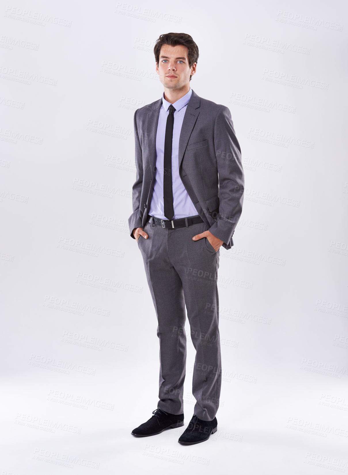 Buy stock photo Business man, pride and hands in pocket for confidence, portrait and professional on white background. Corporate lawyer, cool and ambition in studio with suit, success and serious for career growth